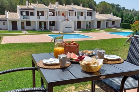 Patio, Dining area, Pool view