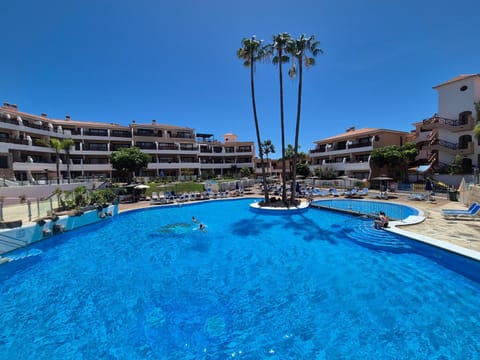 Property building, Pool view, Swimming pool, sunbed
