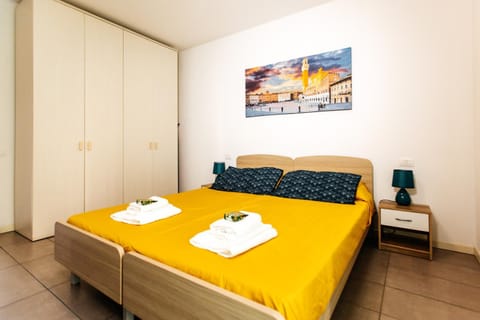 Bed, Photo of the whole room, Bedroom, towels, wardrobe