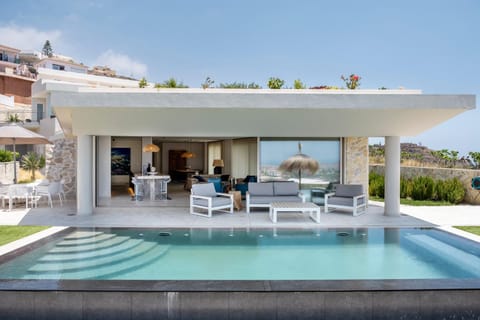 Property building, Living room, Swimming pool