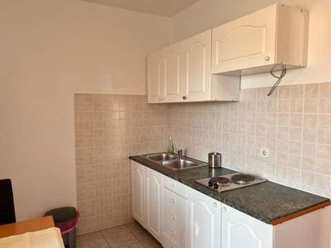 Kitchen or kitchenette, stove, kitchen