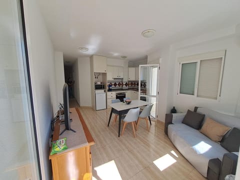 Communal lounge/ TV room, TV and multimedia, Living room, Seating area, Dining area, kitchen, air conditioner