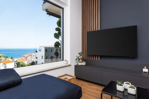 TV and multimedia, View (from property/room), Living room, Sea view