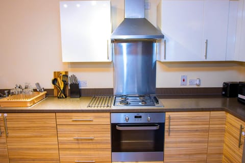 Kitchen or kitchenette, stove