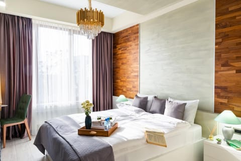Bed, Seating area, Bedroom