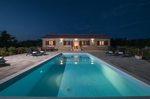 Property building, Night, Pool view, Swimming pool, sunbed