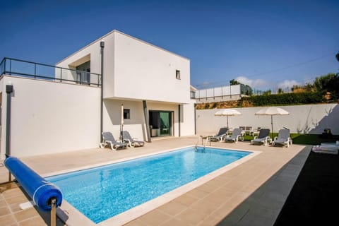 Property building, Swimming pool, sunbed