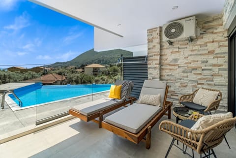 Property building, Living room, Swimming pool