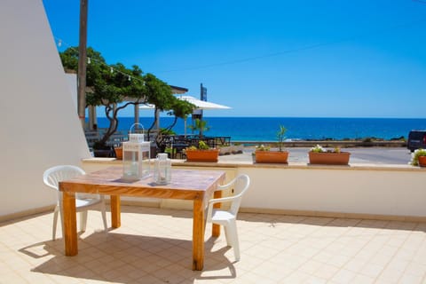 Property building, Patio, Restaurant/places to eat, Day, Natural landscape, View (from property/room), Balcony/Terrace, Seating area, Dining area, Beach, Sea view, Breakfast