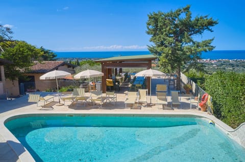 Property building, Living room, Swimming pool