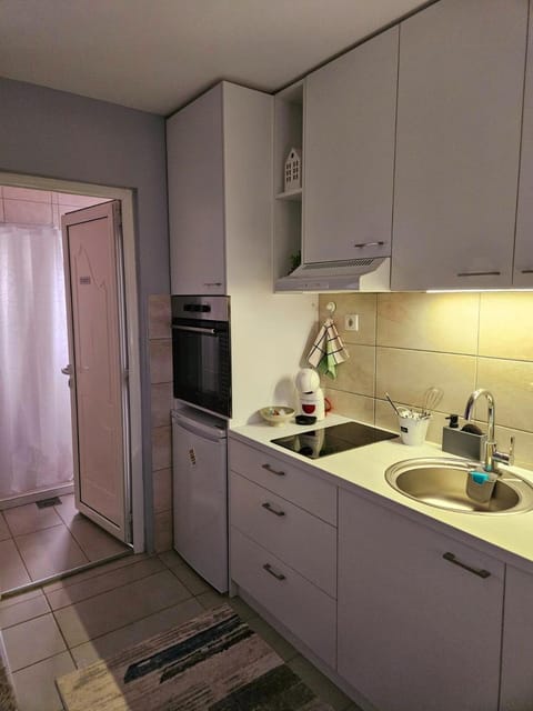 Kitchen or kitchenette, stove