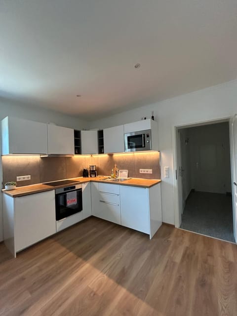 Kitchen or kitchenette, oven, stove