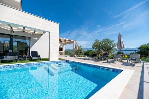 Patio, Day, Natural landscape, Pool view, Sea view, Swimming pool, sunbed