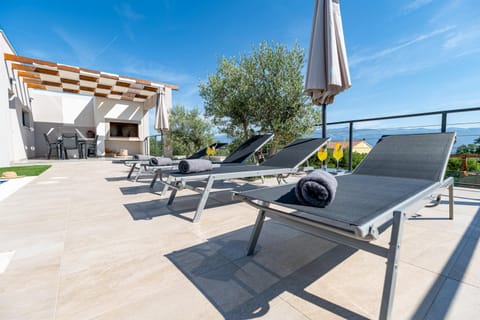 Patio, Day, Natural landscape, View (from property/room), Balcony/Terrace, Living room, Seating area, Pool view, Sea view, Swimming pool, sunbed