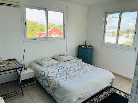 Chambre d'hôtes Sunset Bas du Fort Apartment in Le Gosier