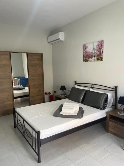 Bed, Photo of the whole room, Bedroom, towels, wardrobe, air conditioner