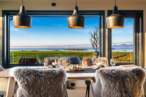 Natural landscape, Living room, Seating area, Dining area, Sea view