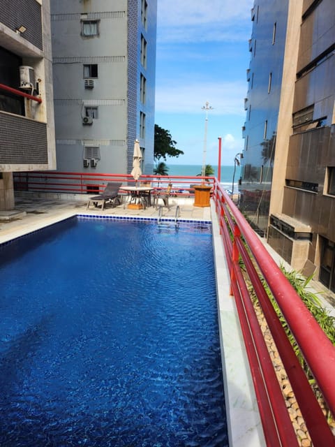 Property building, Day, Pool view, Swimming pool, Swimming pool, sunbed
