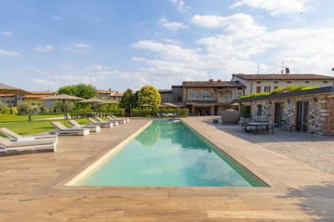 Property building, Pool view, Swimming pool, sunbed