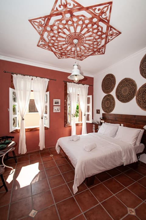 Bed, Seating area, Bedroom