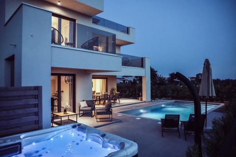 Property building, Patio, Night, Hot Tub, Pool view, Swimming pool