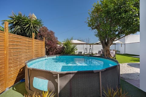 Property building, Living room, Swimming pool