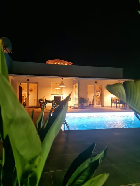Property building, Living room, Swimming pool
