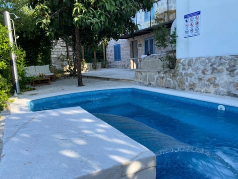 Property building, Patio, Swimming pool