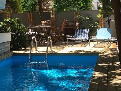 Patio, Pool view, Swimming pool, sunbed