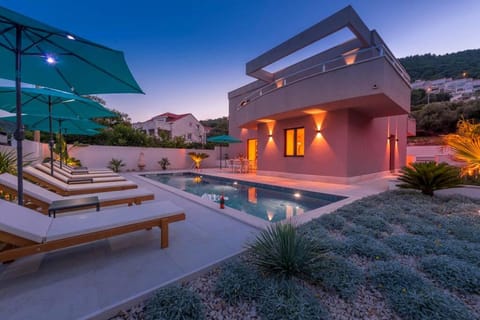 Property building, Patio, Pool view, Swimming pool, sunbed