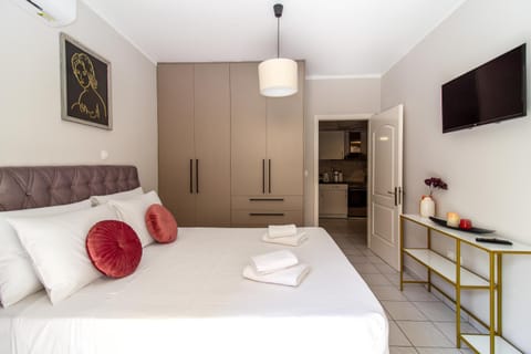 Bed, TV and multimedia, Bedroom, towels, wardrobe