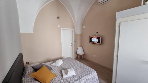 Bed, TV and multimedia, Bedroom, towels, wardrobe, air conditioner