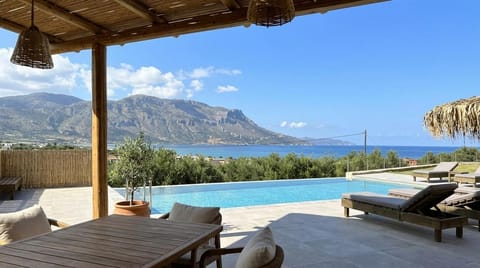 Patio, Nearby landmark, Day, Natural landscape, View (from property/room), Balcony/Terrace, Seating area, Mountain view, Pool view, Sea view, Swimming pool, sunbed