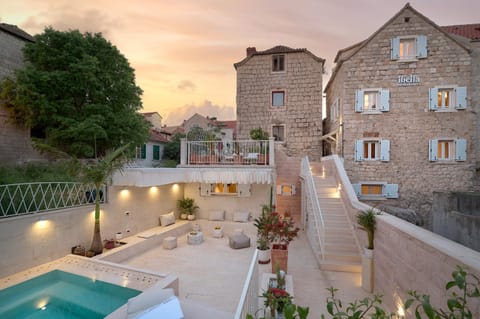 Property building, Seating area, Swimming pool