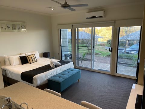 Bed, Seating area, Bedroom, fireplace