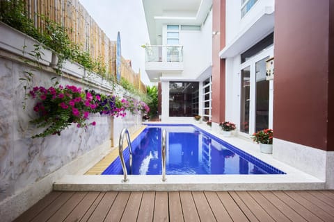 Property building, View (from property/room), Swimming pool, sunbed