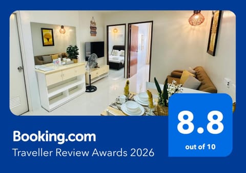 Bed, Property logo or sign, Photo of the whole room, Logo/Certificate/Sign, Bedroom, Text overlay, Certificate/Award