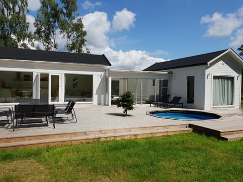 Property building, Patio, Swimming pool, sunbed