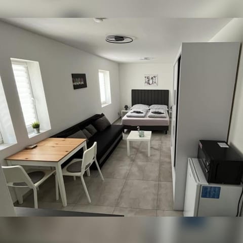 Bed, minibar, wardrobe