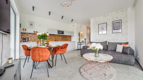 Kitchen or kitchenette, Living room, Seating area, Dining area