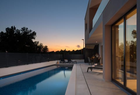 Patio, Pool view, Swimming pool, Sunset, sunbed