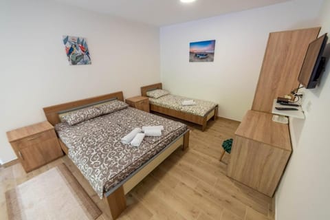 Bed, TV and multimedia, Bedroom, towels, wardrobe