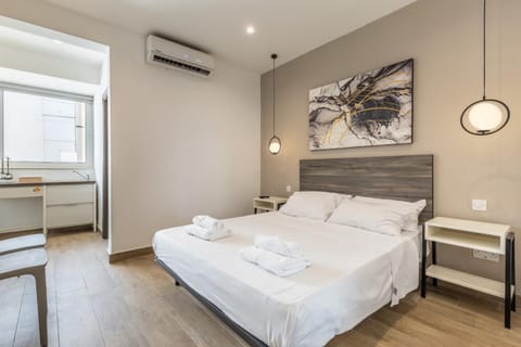 Bed, Photo of the whole room, Bedroom, towels, air conditioner