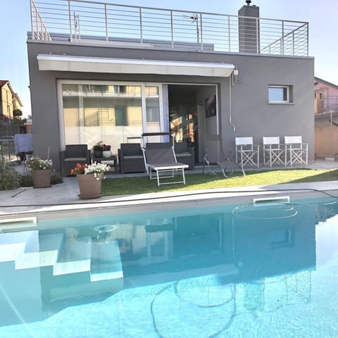 Property building, Living room, Swimming pool