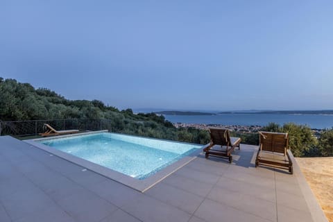 Patio, Natural landscape, Pool view, Sea view, Swimming pool, sunbed