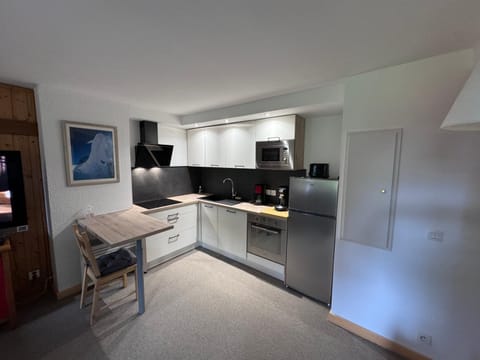 Kitchen or kitchenette, dishwasher, oven, stove, toaster