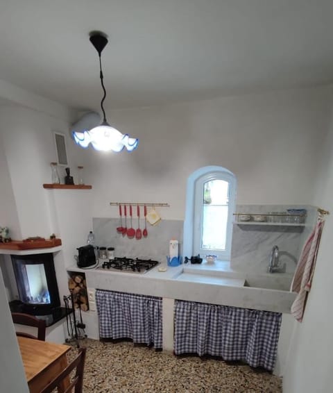 Kitchen or kitchenette, flat iron, stove