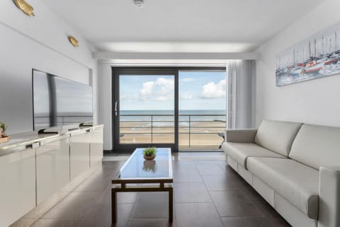 Bed, TV and multimedia, Living room, Seating area, Sea view