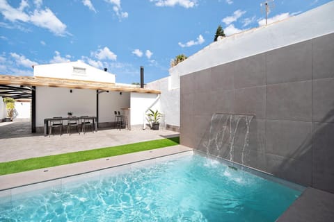 Property building, Living room, Swimming pool