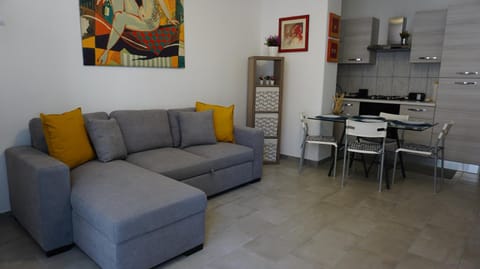 Kitchen or kitchenette, Living room, stove
